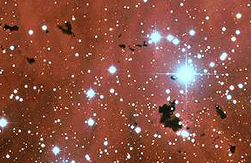 Black patchy Bok globules in the Milky Way, imaged by HST.